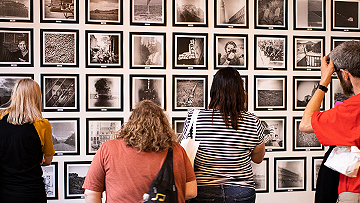 People viewing images at a gallery